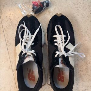 New Balance Black and White Low-Profile Running Sneakers